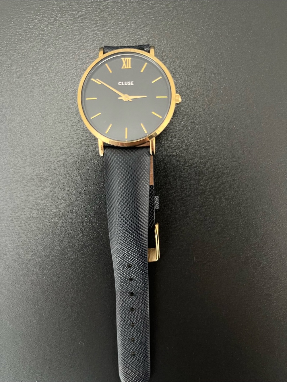 Woman’s Black and Gold Minimalist Leather Watch
